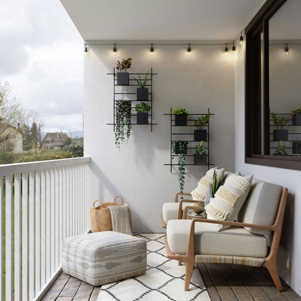 How can you design a balcony for privacy and relaxation?